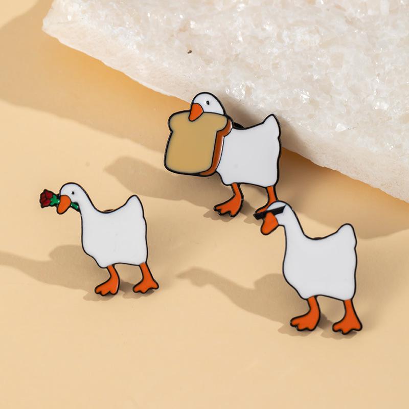 Urocza Broszka Kaczuszka z Kreskówki – Kreatywne Metalowe Akcesoria do Odznak