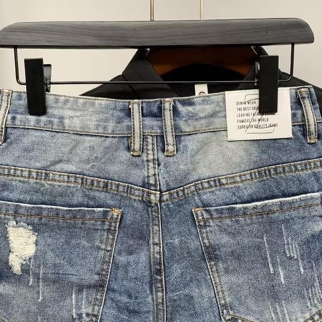 Pantaloncini di jeans con foro dritto e vestibilità ampia da uomo Pantaloncini di jeans strappati con taglio estivo di marca di moda