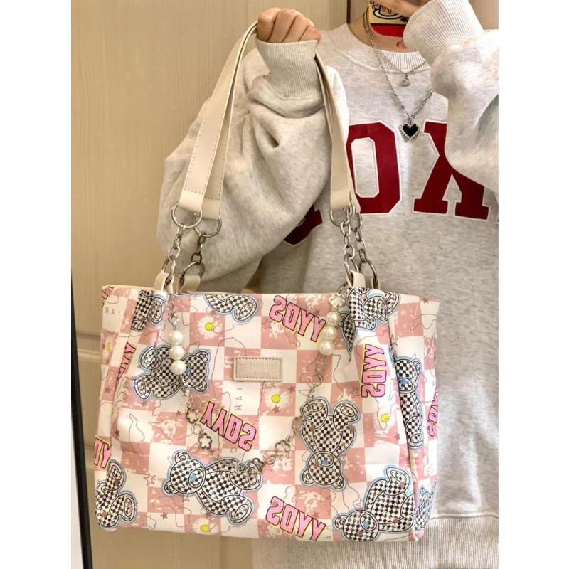 

Commuter large-capacity tote bag female 2 new bear graffiti student versatile shoulder bag canvas bag