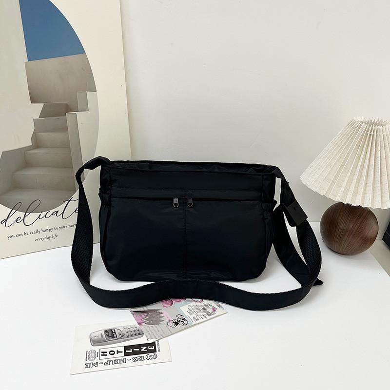 

Stylish Black Nylon Tote Bag For Women With Spacious Design For Daily Commuting And Casual Use чорний