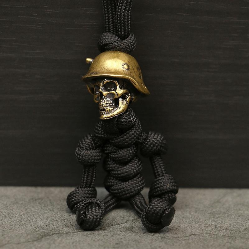 

1PC Skull Head Keychain Car Biker Helmet Pendant Keychain Braided Rope Paracord Buddy Bag Hanging Backpack Doll Toy A2