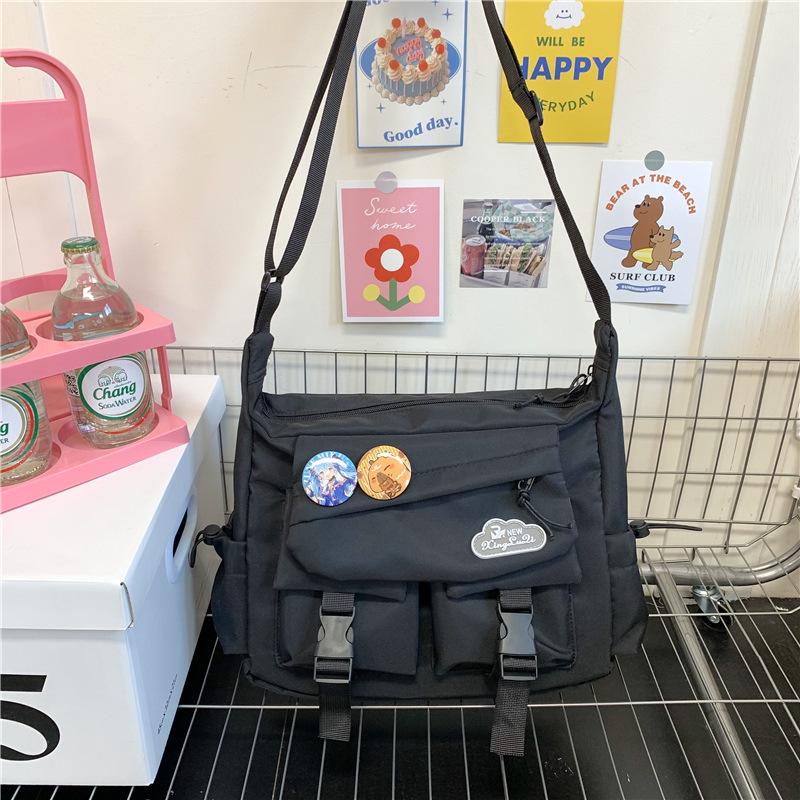 Spring and summer new messenger bag men's trendy brand large capacity ins shoulder bag Japanese casual mailman bag versatile small satchel