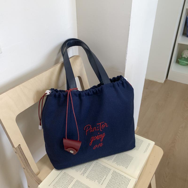 

Canvas bag women s large-capacity new summer versatile casual shoulder drawstring bag college student tote bag синий