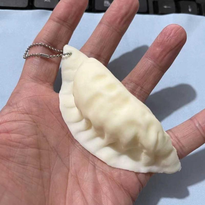 1-5pcs Creative Dumpling Kneading Music Relieving Toy Keychains Creative Food Play Venting Prank Toy Pendants