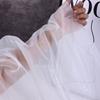 The thickened and encrypted soft light organza fabric can be used for wedding dresses evening gowns and designer clothing fabric