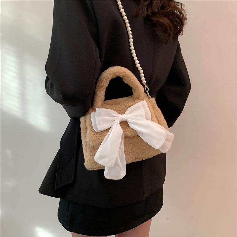 Autumn and winter new temperament fashionable plush texture simple travel small square portable bow small bag female tide