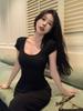 Summer New Short-sleeved Backless and Thin Hip-wrapped Split-ended Long Dress Design Sense Slim Waist Texture Black Dress