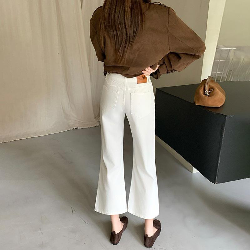 Autumn new white denim nine-point slim-fit flared pants women's leather brand black apricot
