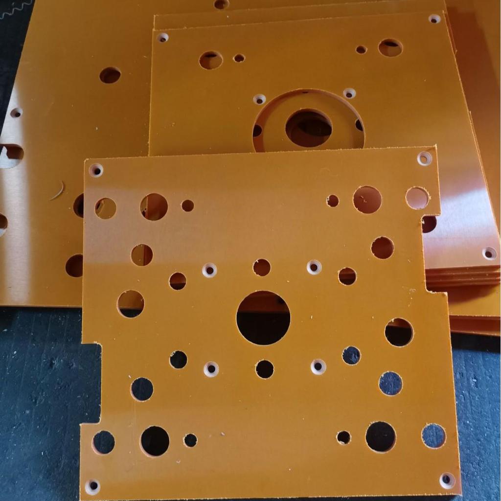 A-Grade Orange & Black Bakelite Sheet: Heat-Resistant Insulation Board for Engraving & Machining.