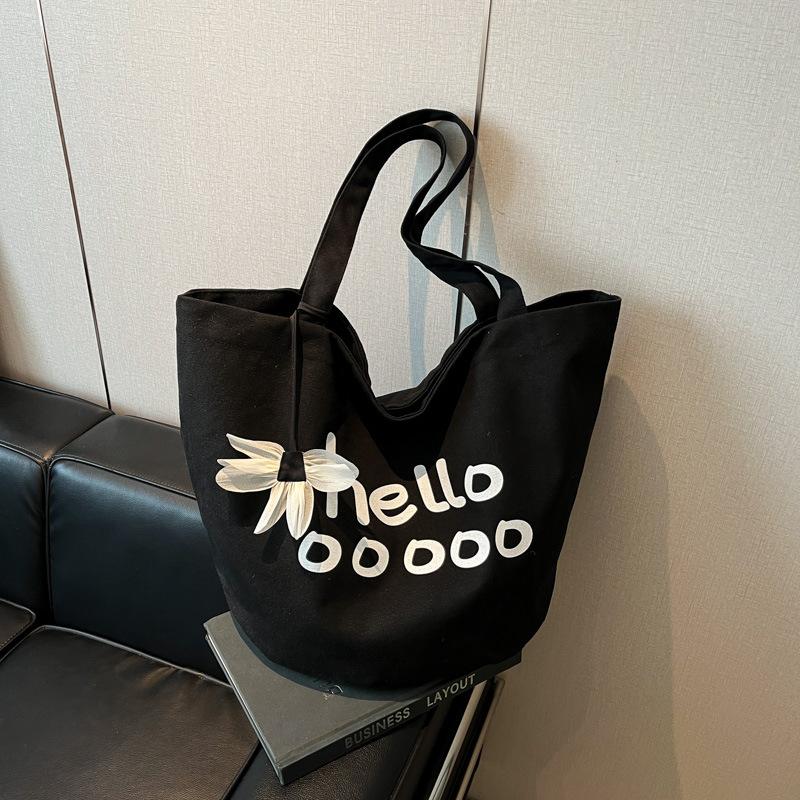 

Casual large-capacity canvas bag women s new simple student class shoulder commuter tote bag чёрный