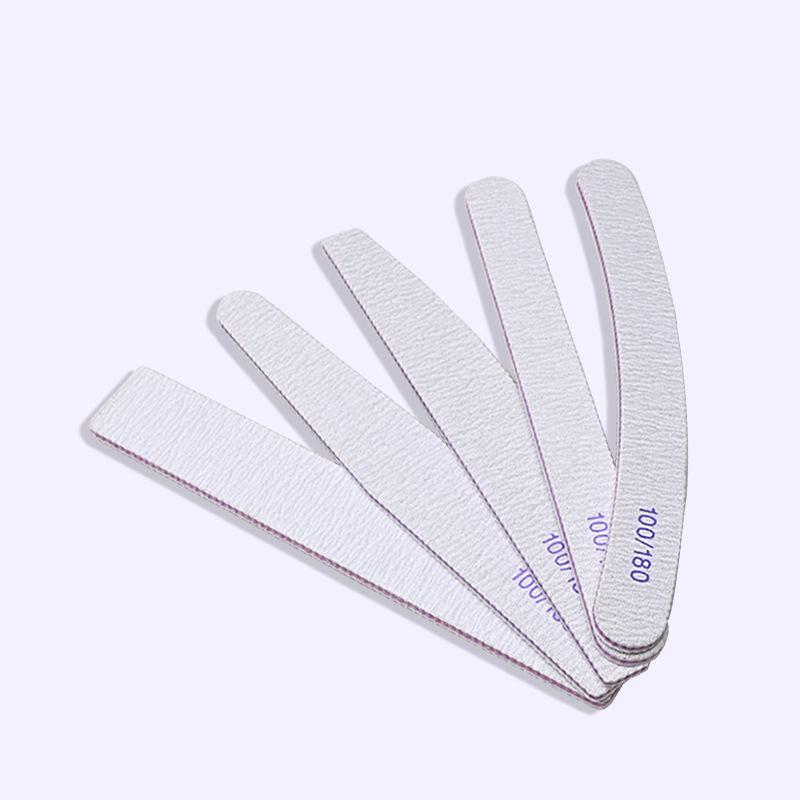 Double-Sided Gray Nail File: Durable Sandpaper Strip for Shaping and Repairing Nails.