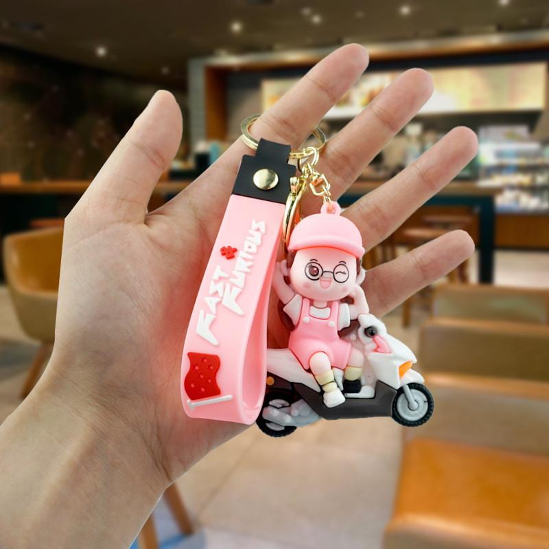

Cute Motorcycle Cartoon Keychain For Men And Women Trendy Rubber Accessory рожевий