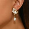 1Irregular geometric water drop imitation pearl zircon earrings are suitable for daily commuting and holiday parties