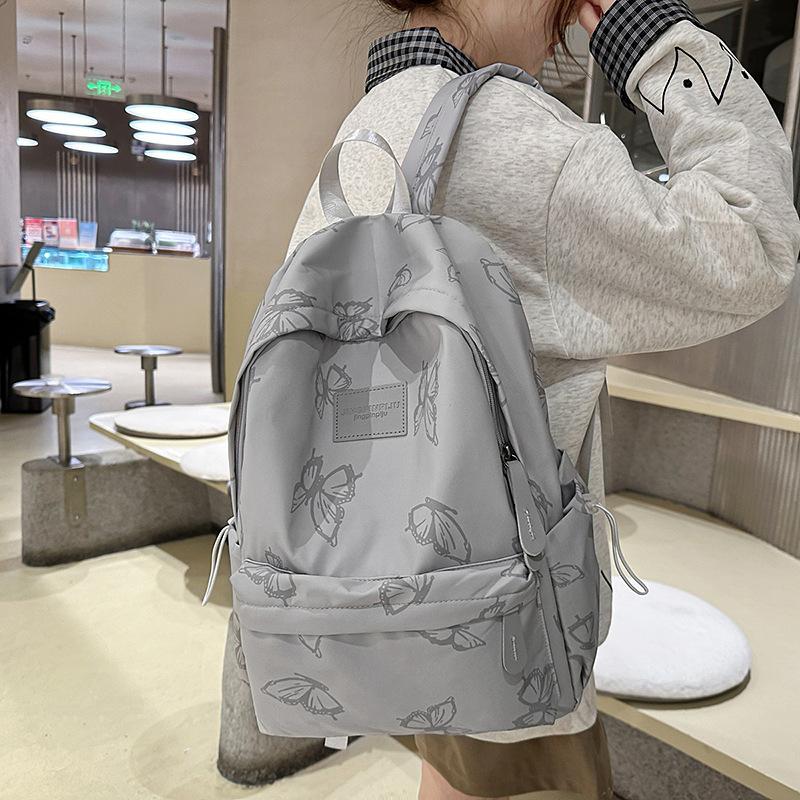 

Школьный рюкзак Высококачественный легкий рюкзак Студенческий рюкзак Досуговый большой вместимости Школьный рюкзак для ученика средней школы серый