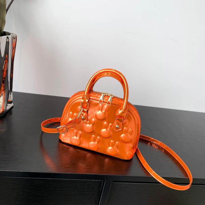 

Модна портативна сумка-оболонка для жінок 2024 літа, нова лазерна цукеркова кольорова сумка-месенджер через плече, повсякденна проста сумка-месенджер помаранчевий