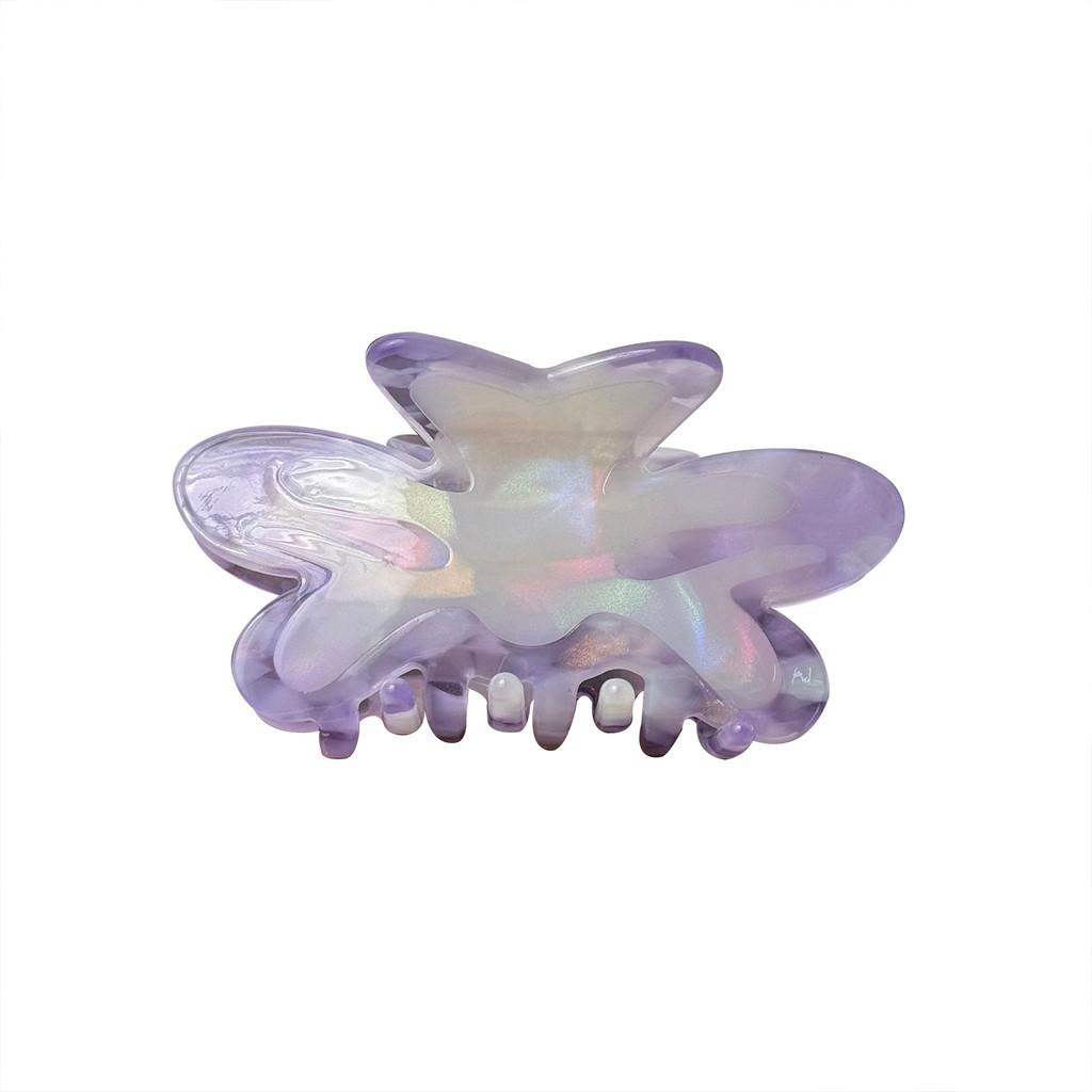 Snyggt och snyggt hårspänne för kvinnor i livfulla prickiga färger för trendiga uppsättningar