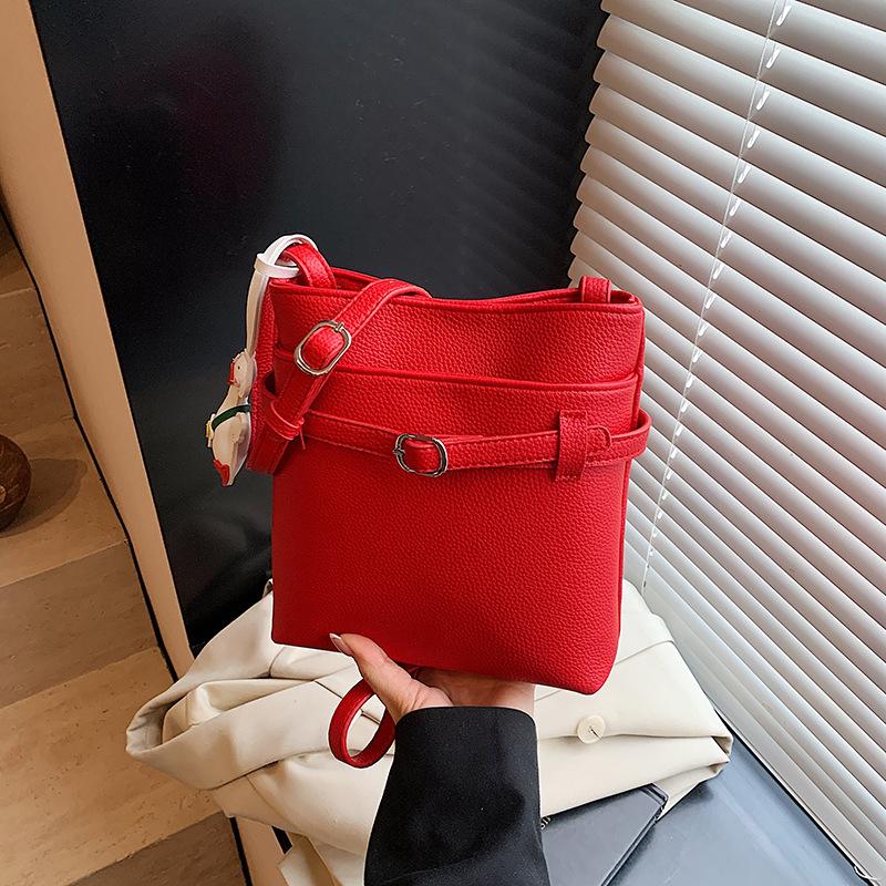 Versatile commuter lychee pattern bucket bag women's spring summer new commuter shoulder messenger mobile phone bag tide