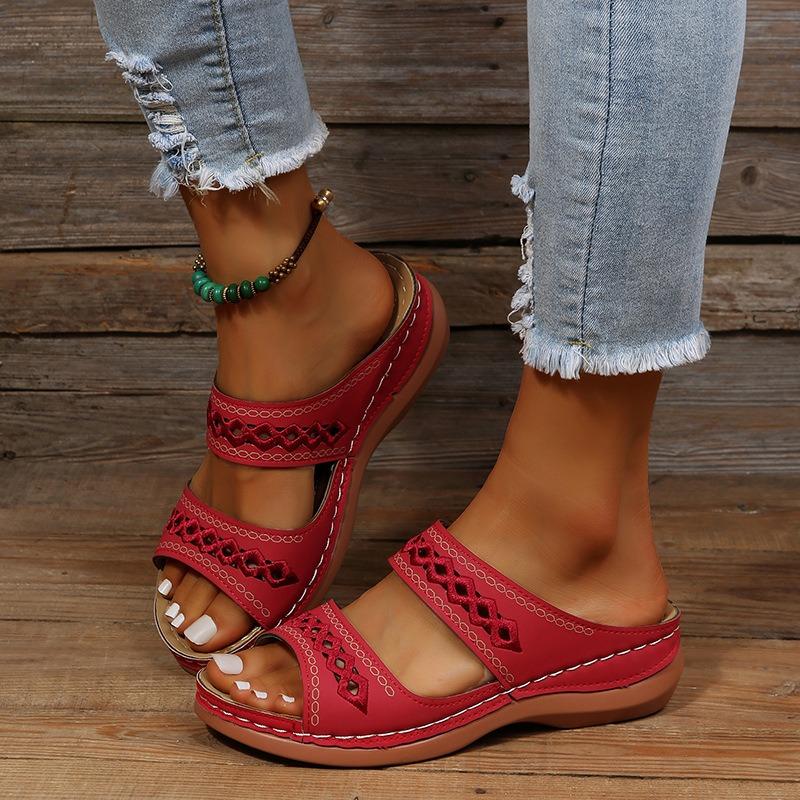 Spring and summer new season large size hollow slope heel cool slippers women wish hollow outside wear non-slip retro