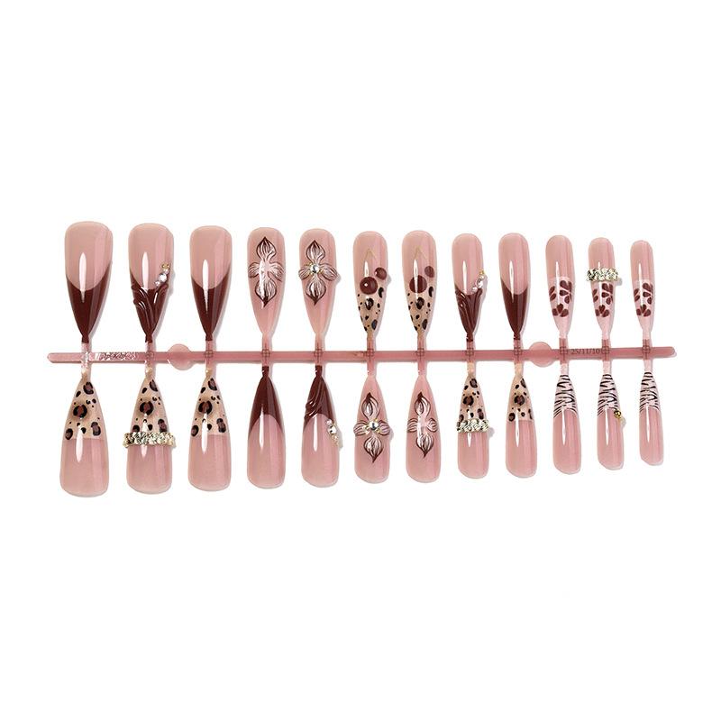 European & American almond press on nails with leopard print, chains and 3D flowers, premium finished fake nails for wholesale.