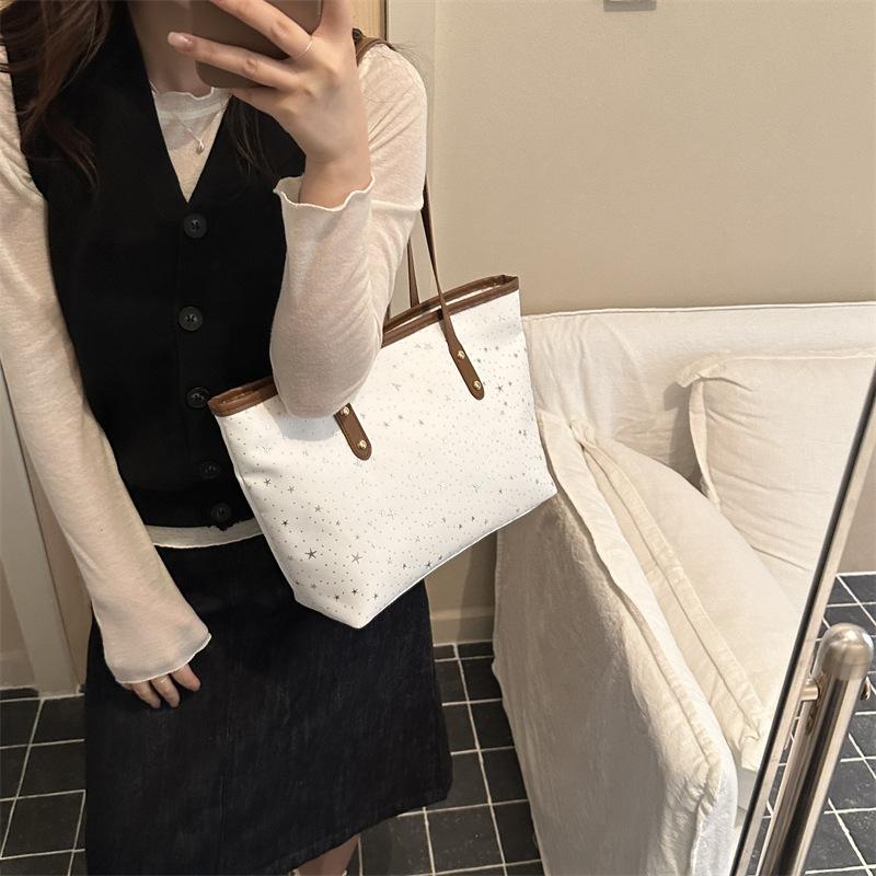 Personnalité étoile style étranger printemps nouveau grande capacité tendance style doux portable fourre-tout épaule aisselle sac pour femmes