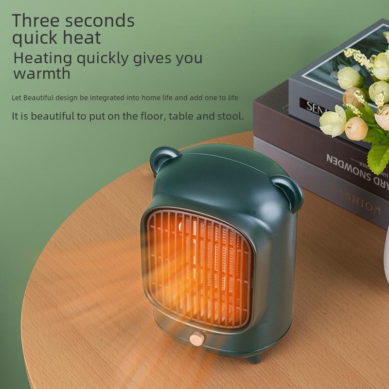 New Style Cartoon Mini Desktop Electric Heater - Complies with EU, US, and Japanese Standards.