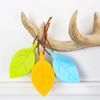 1pc Leaf Shaped Silicone Door Stopper, Polished Metal Surface, Hangable Windproof Door Stop, Anti-Pinch Safety Door Clamp Best