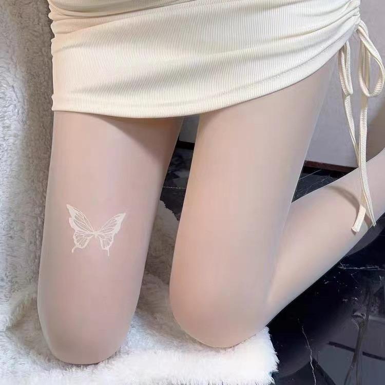 Flocking printing three butterfly stockings anti-hook silk thin niche white butterfly black silk ultra-thin sexy Internet celebrities