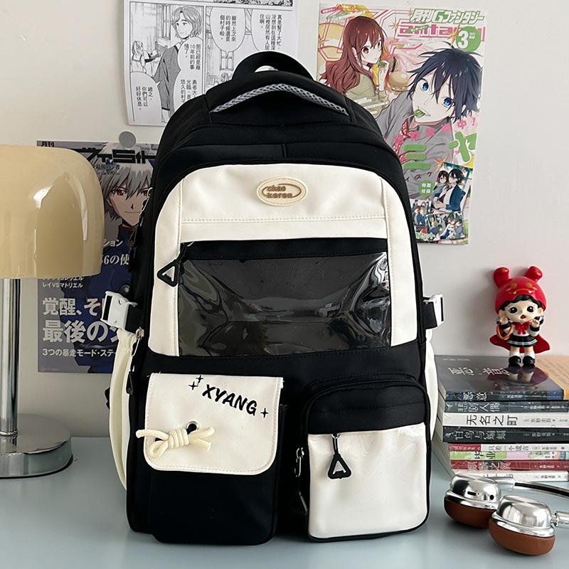 The new schoolbag is high-value, fresh and sweet, contrasting colors, splicing, and early high school students' lightweight travel backpack.