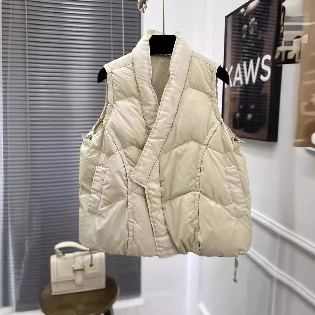 

Осень и зима новый дизайн чувство свободного мода диагональная планка тонкий пуховый жилет жилет женская куртка жилет легкий L