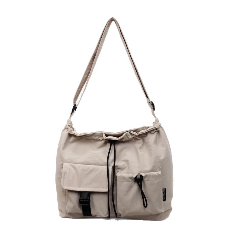 Korean Version of The Small Fresh Drawstring Bucket Bag Lady Solid Color Texture Nylon Shopping Bag Cute One-shoulder Messenger Bag