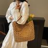 Handwoven Straw Tote Bag with Leather Handles and Open Weave Design Perfect for Summer Beach and Casual Outings