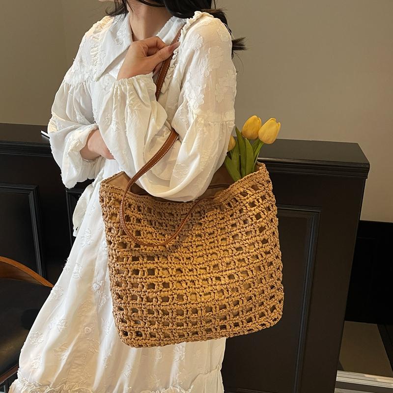 Handwoven Straw Tote Bag with Leather Handles and Open Weave Design Perfect for Summer Beach and Casual Outings