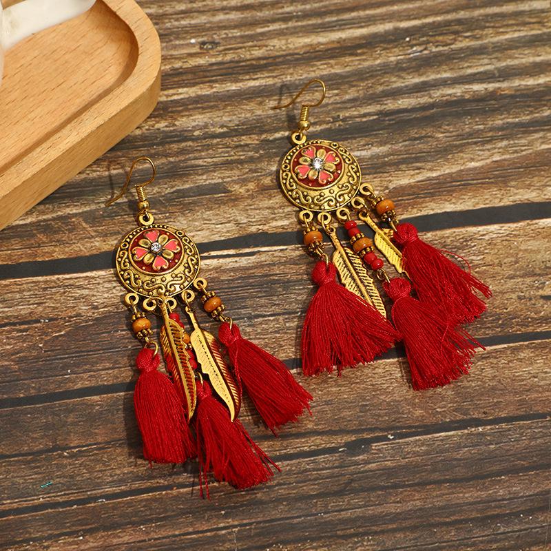 Bohemian Faux Silver Feather Tassel Mosquito Coil Earrings: Summer Retro Ethnic Ear Jewelry