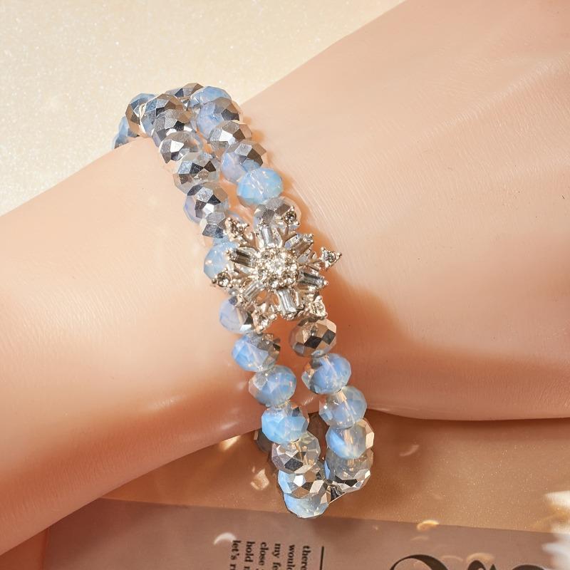 A Christmas ornament temperament new cut-face crystal glass bead snowflake beaded bracelet, ladies and girls
