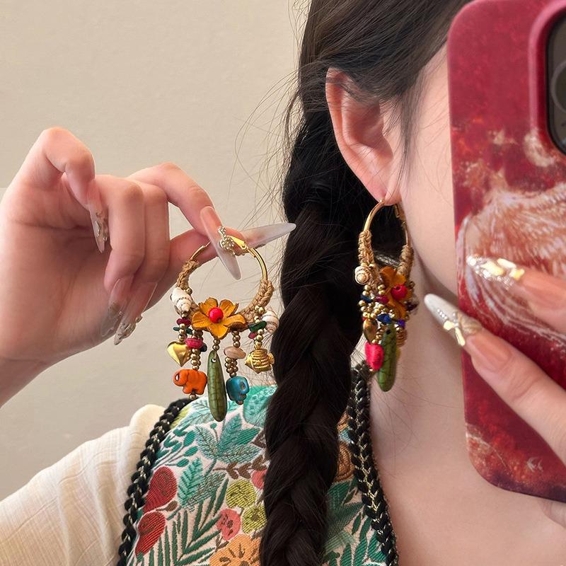 Silver needle woven flower stone fringed earrings retro ethnic style fashion earrings design sense niche versatile earrings