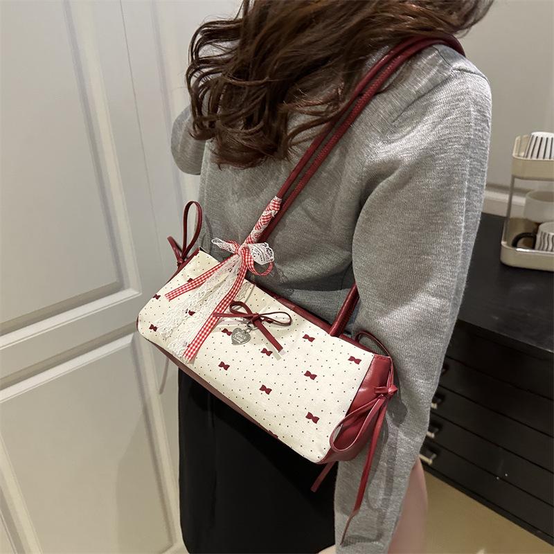 Fashion versatile sweet bow underarm bag women's 2025 summer simple niche high-end single shoulder handbag