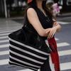 Premium black and white striped tote bag woven large capacity shoulder women's bag lazy wind lightweight vacation bag shopping bag