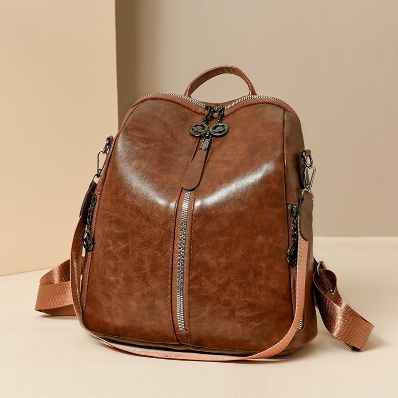 Ein Retro-Freizeitrucksack aus weichem Leder für Damen, eine modische und vielseitige Pendeltasche