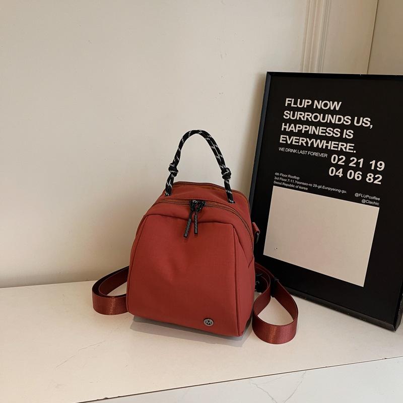 Fashion sense small backpack women's lightweight casual shoulder bag new fashion commuter shell bag simple commuter messenger bag