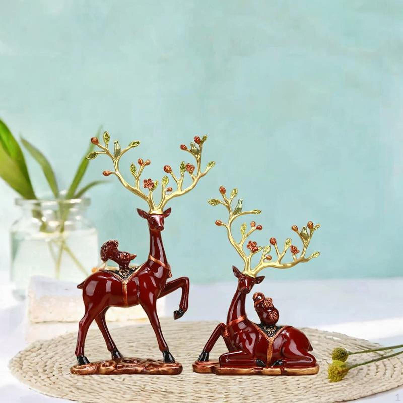 

2 скульптуры оленей для декоративного использования в жилых помещениях красный