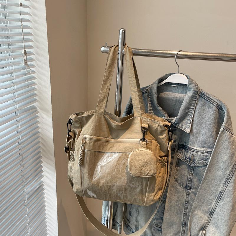 

2025 summer new large-capacity commuter cloth bag casual solid color nylon messenger bag shoulder underarm tote bag хаки