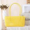 Handgefertigte Plastik-Hohlgeflecht-Tasche Landhausstil Große Kapazität Strand-Tragetasche Eimer-Tasche Damen-Handtasche Sommer-Strandtasche