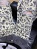 Women's Leopard Print Ripped Wide-Leg Jeans with Double Waistband - Slimming Patchwork Floor-Length for Early Autumn.