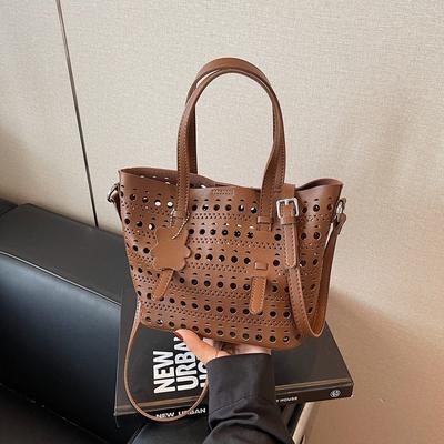 Sac petit populaire pour femmes été nouveau sac messager creux polyvalent sac seau portable