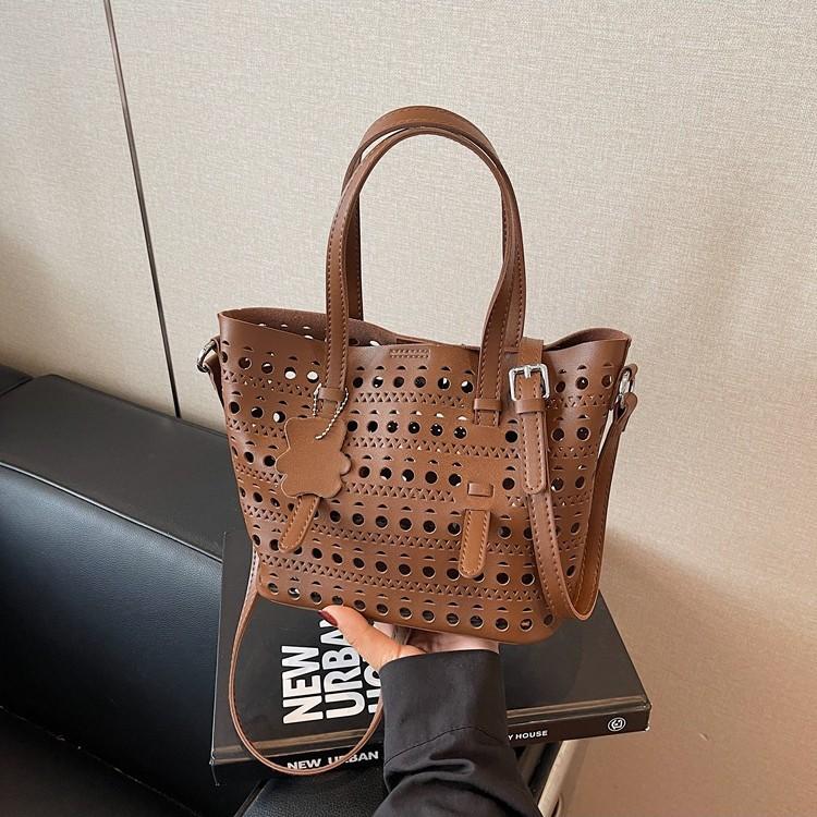 Popular small bag women's summer new versatile hollow messenger bag portable bucket bag