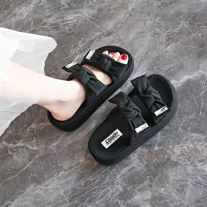 

Шлепанцы на толстой подошве с бантом для женской летней обуви 2025 лето новый высококлассный модный увеличивающий рост пляжный нескользящий драг 40 чёрный