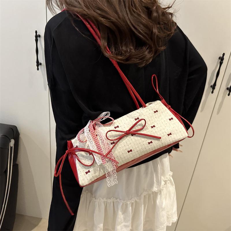 Sweet bow small bag women 2025 new commuter versatile shoulder armpit bag fashion temperament fresh lady