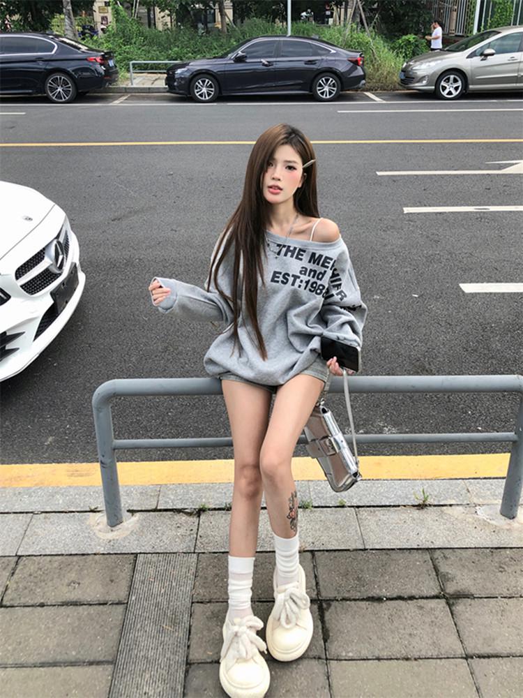 American-Style Oversized Off-Shoulder Sweater: Letter Print, Long Sleeve, Casual Loose Fit for Women In Early Autumn.