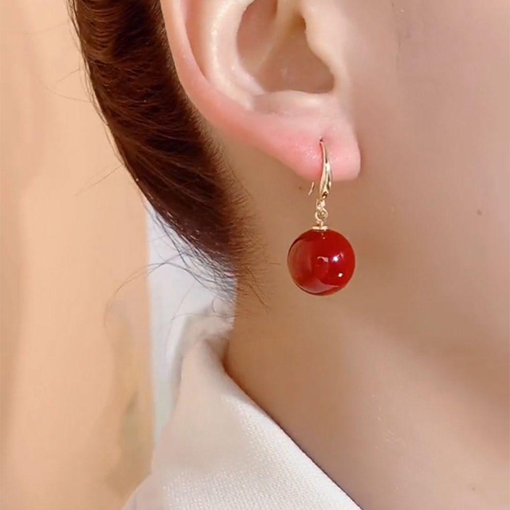 2024 French Minimalist Red Pearl Earrings: Elegant Retro High-End Ear Hooks for a Festive New Year