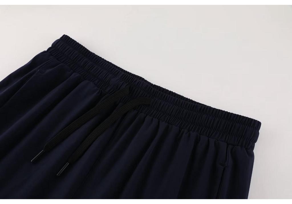 2024 Men's Quick-Dry Outdoor Running Shorts – Mid-Length, Loose Fit for Casual Fitness.